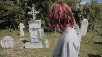 Augie spends a lot of time wondering through the graveyard and house that was once Eva's centuries ago, slowly succumbing to her powers.